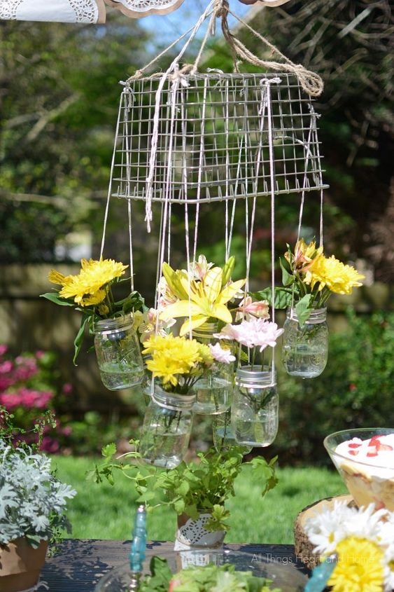 s 11 gardening hacks using empty glass jars, gardening, repurposing upcycling, Bring more blooms into colorless garden spots