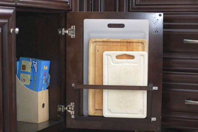 the 15 smartest storage hacks for under your sink, Build a shallow holder for cutting boards