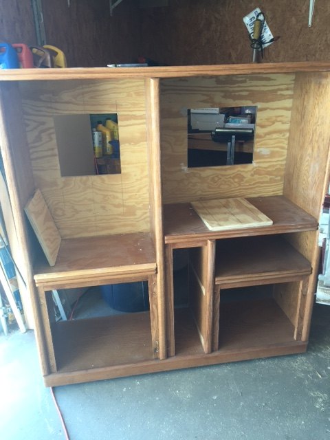 repurposed entertainment center for slimy critter fanatics