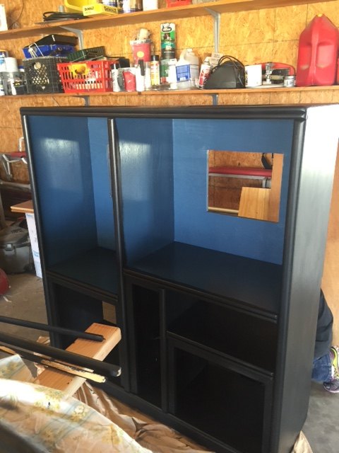 repurposed entertainment center for slimy critter fanatics