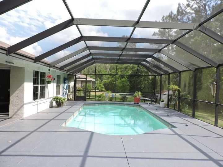 would it look right to put an outdoor kitchen under screened pool