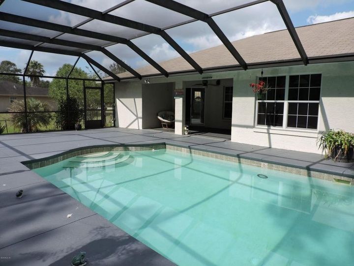 q would it look right to put an outdoor kitchen under screened pool , home decor, home decor dilemma, kitchen design, outdoor living, pool designs