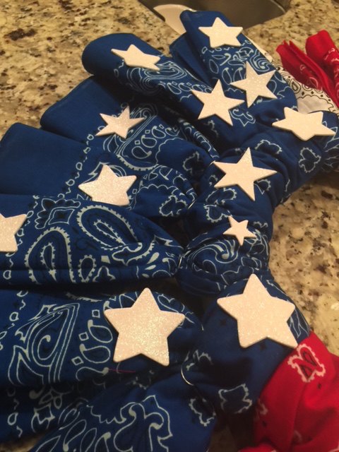 red white and blue ti ful bandana wreath, crafts, how to, patriotic decor ideas, wreaths, Step 5 attach stars on blue bandanas