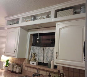 A homeowner wanted to update her kitchen. First she knocks ...