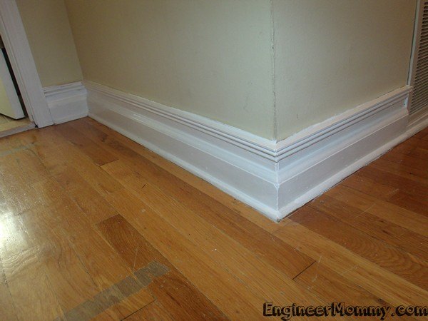 9 tricks to turn builder grade baseboards into custom made beauties, Stick regular trim 3 inches above baseboards