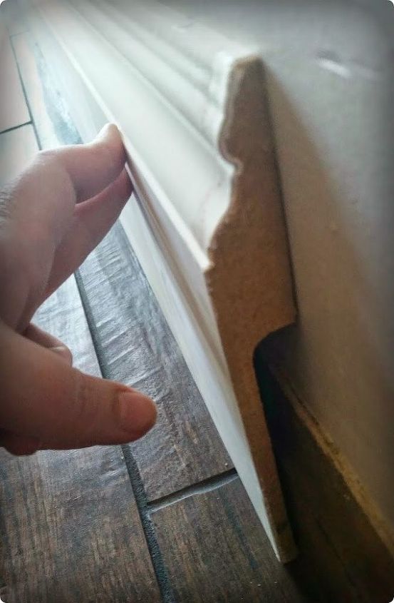 9 tricks to turn builder grade baseboards into custom made beauties, Put a larger molding right on top