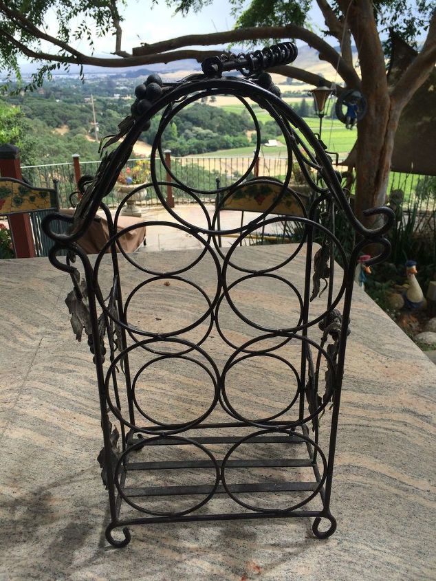 q any ideas on how i can upcycle this bottle holder for outside decor , gardening, home decor, repurpose household items, repurposing upcycling