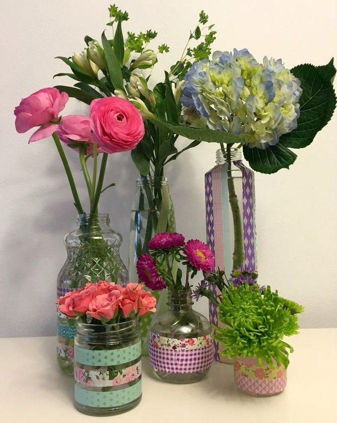 cut a piece of washi tape for these 25 creative ideas, Adhere pieces to jars for improvised vases