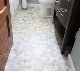 s 11 actually helpful tricks for decorating a small bathroom, bathroom ideas, Cut a brand new floor out of one vinyl sheet