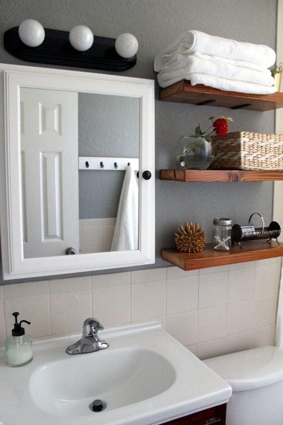 s 11 actually helpful tricks for decorating a small bathroom, bathroom ideas, Use pretty storage that doubles as decor