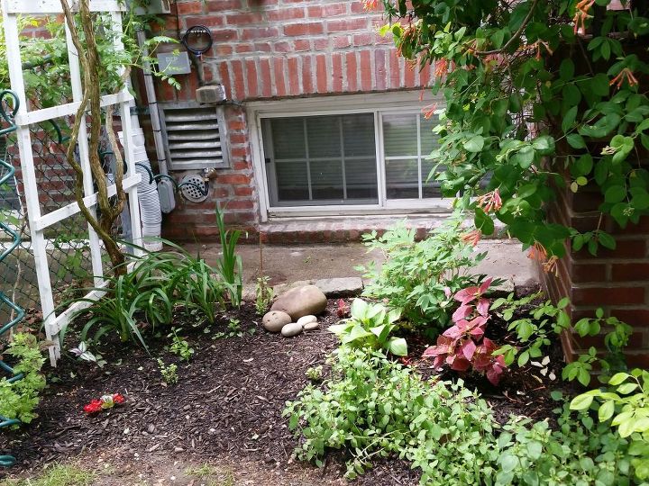 turn a meh corner garden corner into a wow in 6 easy steps, gardening, landscape, Clusters of stones will add visual interest