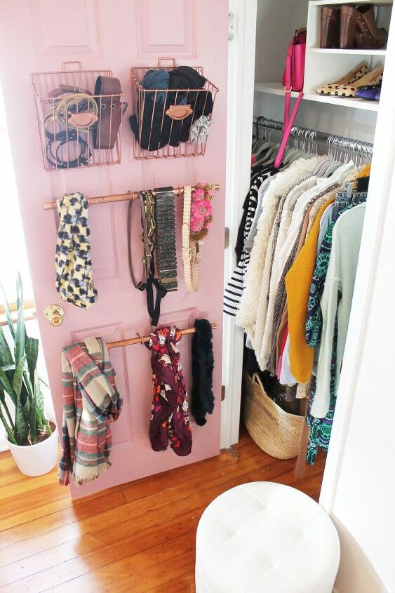 s 13 beauty hacks for your overstuffed closet, closet, doors, organizing, Put stylish pipe hangers inside your door