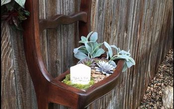 A Broken Old Chair Up-Cycled Into A Succulent Wall Planter