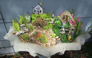 Creating a Fairy Garden Out of a Old Cement Flower Urn....