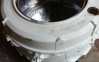  Luminária de teto feita de tambor de máquina de lavar.