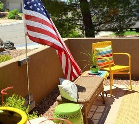 decked out summer porch decor, home decor, A summer flag whipping in the breeze