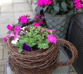 s 13 ideas for having the cutest front steps on the block, container gardening, outdoor living, porches, Twist grapevine wreaths into tea cup planters