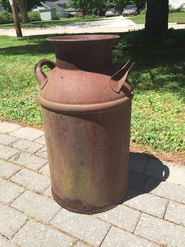 rusted milk can