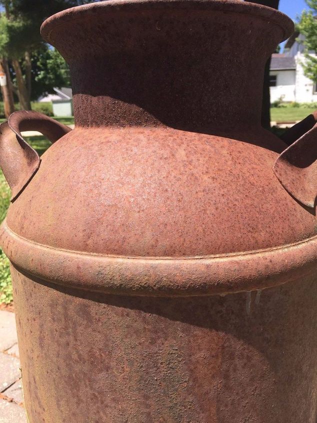 rusted milk can