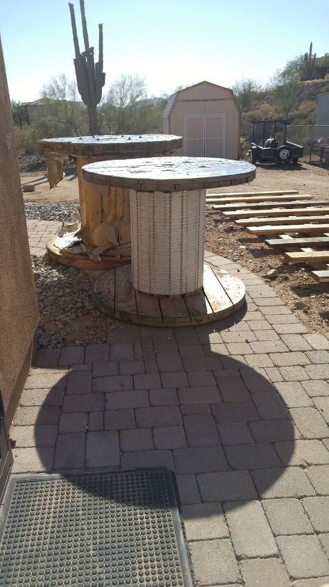 q i ve started a new project a table out of a cable spool , painted furniture, repurpose building materials, repurposing upcycling, As you can see they re very large spools with the wire they re probably very sturdy without the wire they re very wobbly