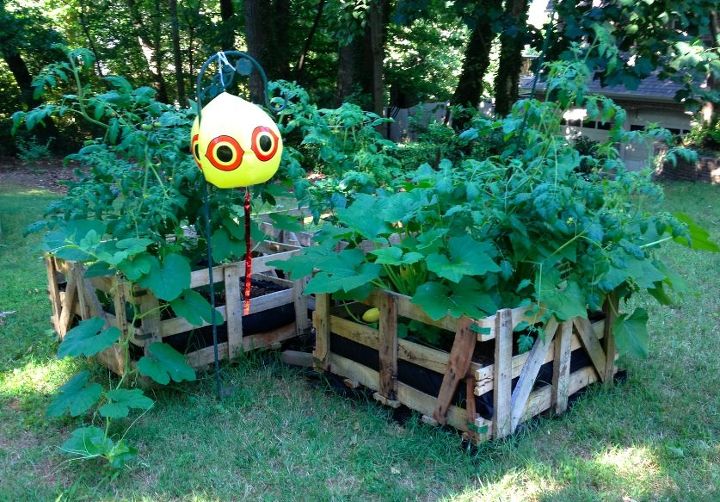13 easiest ways to build a raised vegetable bed in your garden, You could also drag in some pallet crates