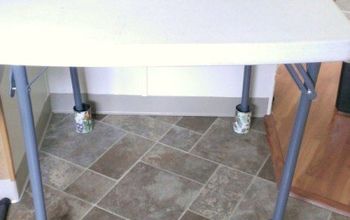Using Cans to Raise a Table.