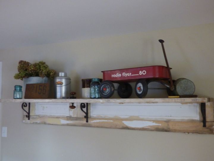 a shelf made from an old farmhouse door, doors, repurposing upcycling, shelving ideas, woodworking projects