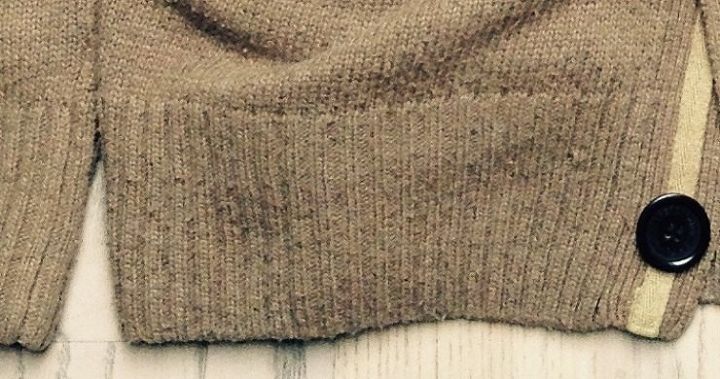 q please help to save my favorite sweater , My old sweater Lint everywhere
