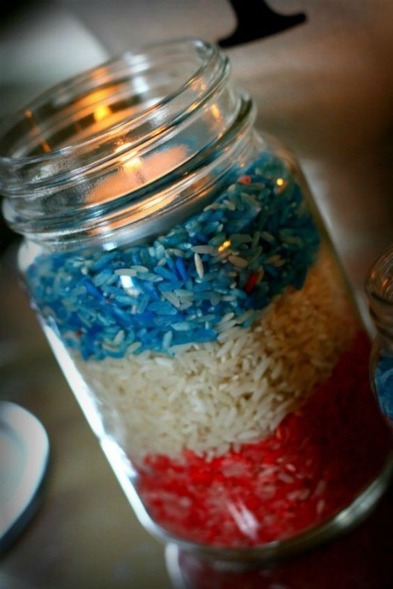 s 13 july 4th decorations that will blow your bbq guests away, crafts, outdoor living, seasonal holiday decor, Dye rice for July 4th jar luminaries