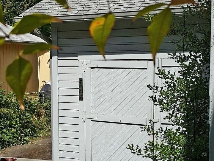 q i want to salvage these old garage doors any suggestions , doors, garage doors, repurpose building materials, repurposing upcycling, This shows one of the two Carriage style doors on my garage