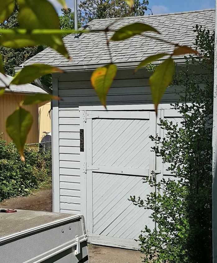 q i want to salvage these old garage doors any suggestions , doors, garage doors, repurpose building materials, repurposing upcycling, This shows one of the two Carriage style doors on my garage