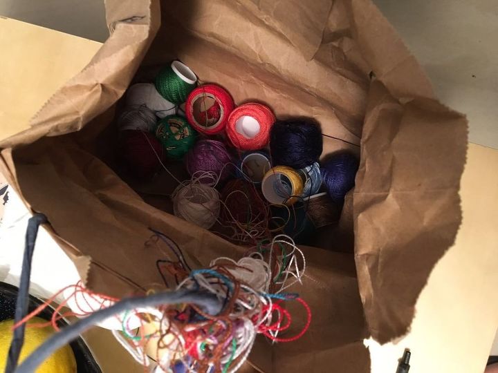 ikea hack paper towel holder turned into a crochet thread organizer