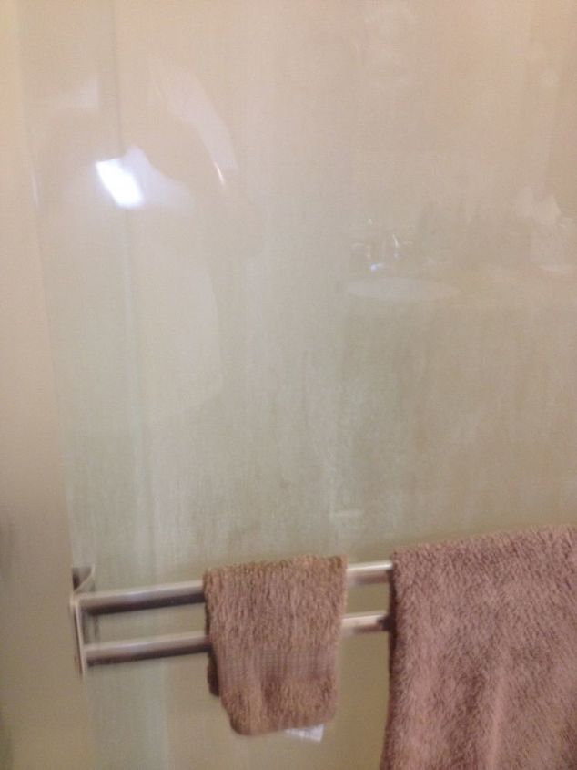 how do you clean hard water spots on shower doors