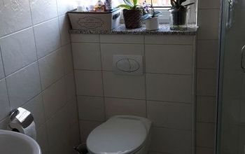 Updating dated bathroom tiles with concrete?