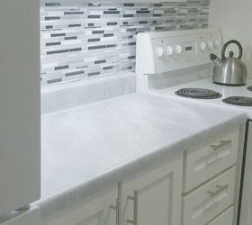 13 ways to instantly brighten up a boring kitchen, Give your countertops a faux marble makeover