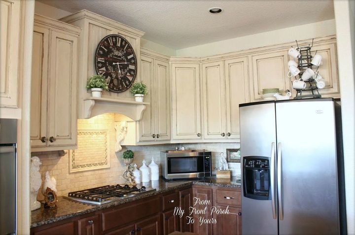 s 13 ways to instantly brighten up a boring kitchen, kitchen cabinets, kitchen design, painting cabinets, Paint dark cabinets with a chalky white wash