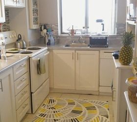 13 ways to instantly brighten up a boring kitchen, Add a bright rug using paint and canvas