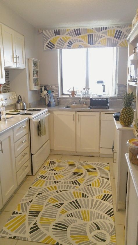 13 maneiras de iluminar instantaneamente uma cozinha chata, pano de cozinha pintado