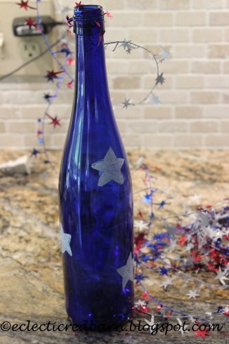 4th of july wine bottle centerpiece, crafts, patriotic decor ideas, repurposing upcycling, seasonal holiday decor