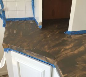 changing up an orange formica countertop with concrete, First coat