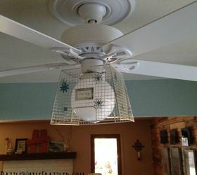 13 ways to upgrade your boring ceiling fan on a budget, Slide a wire basket over the light fixture