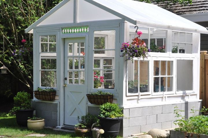 s wait they did what in their backyard , outdoor furniture, outdoor living, Build a greenhouse from vintage windows