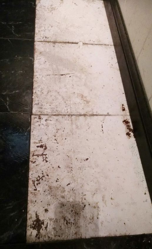 fixing uneven spots under vinyl tiles on a kitchen floor, Floor under tile