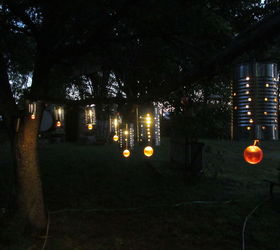 s 16 unexpected ways to use christmas lights this summer, christmas decorations, home decor, lighting, repurposing upcycling, Craft tin can lanterns for your outdoors