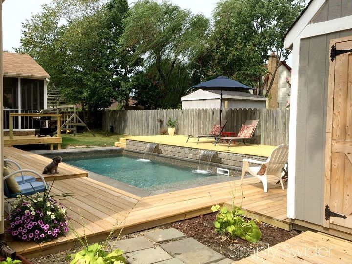 s wow 11 dreamy ideas for people who have backyard pools, outdoor living, pool designs, Add a raised sun bathing platform