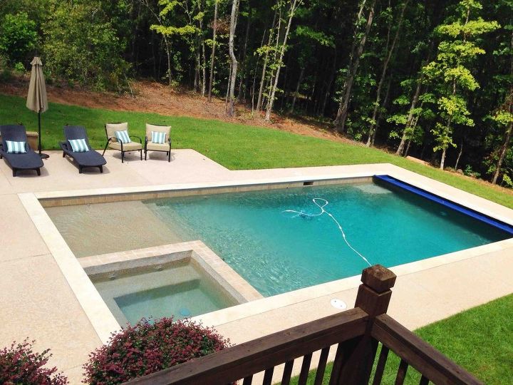 s wow 11 dreamy ideas for people who have backyard pools, outdoor living, pool designs, Build in a shallow sloped pool entrance