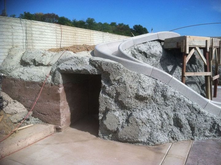 s wow 11 dreamy ideas for people who have backyard pools, outdoor living, pool designs, Add a playful coal mine complete with slide