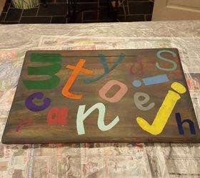 giving a child s desk new life, painted furniture, Stenciling letters on top