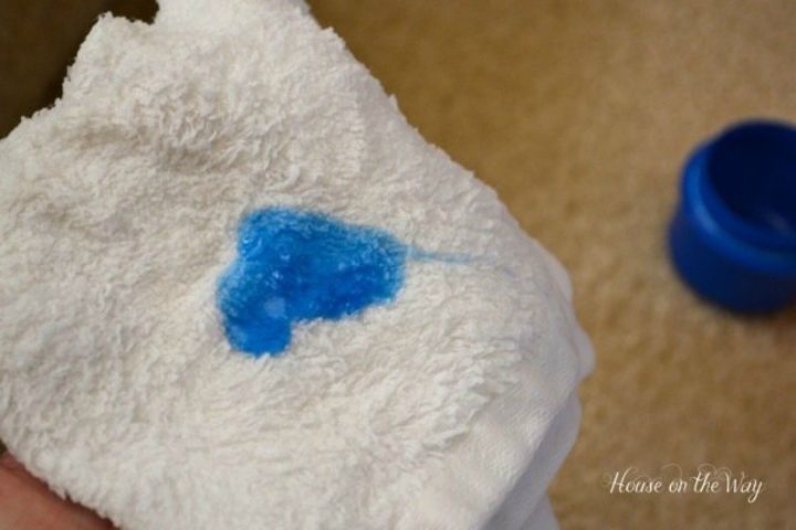 s 12 cleaning tricks that people with spotless living rooms swear by, cleaning tips, entertainment rec rooms, living room ideas, Treat carpet stains using laundry detergent