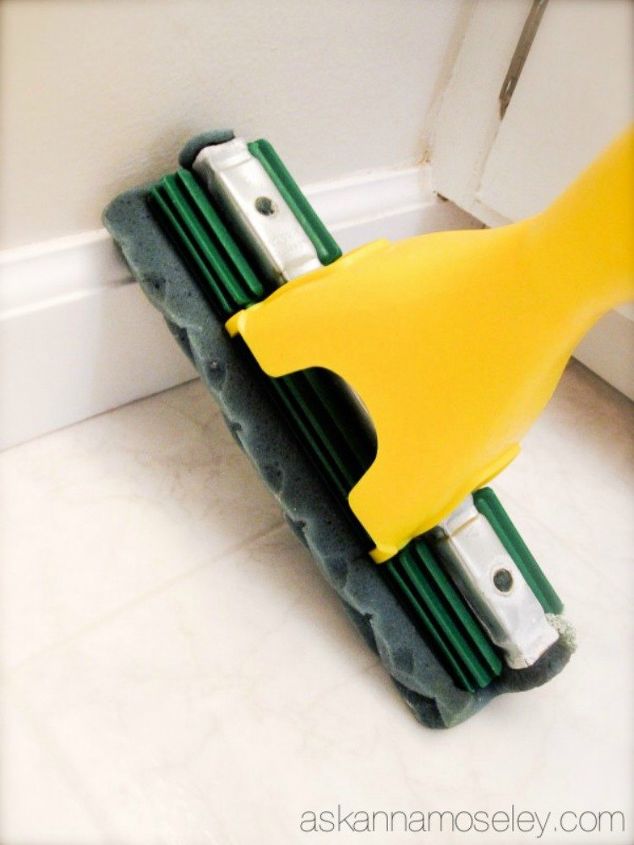 s 12 cleaning tricks that people with spotless living rooms swear by, cleaning tips, entertainment rec rooms, living room ideas, Clean baseboards while cleaning the floor
